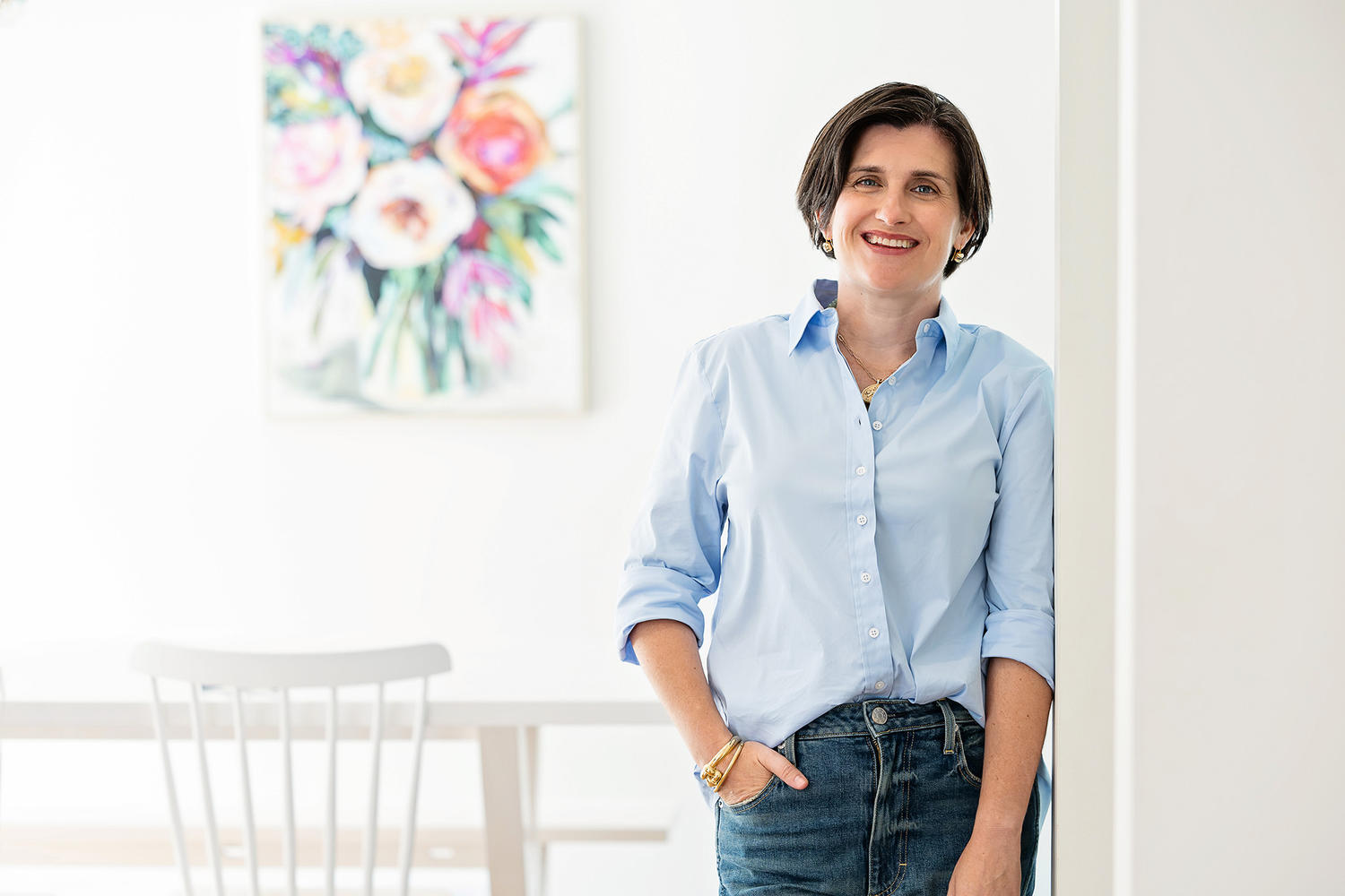 Katie Speetzen standing and smiling, working portrait